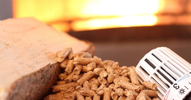 Briketts und Thermostatregler zum Thema Heizen und Lüften